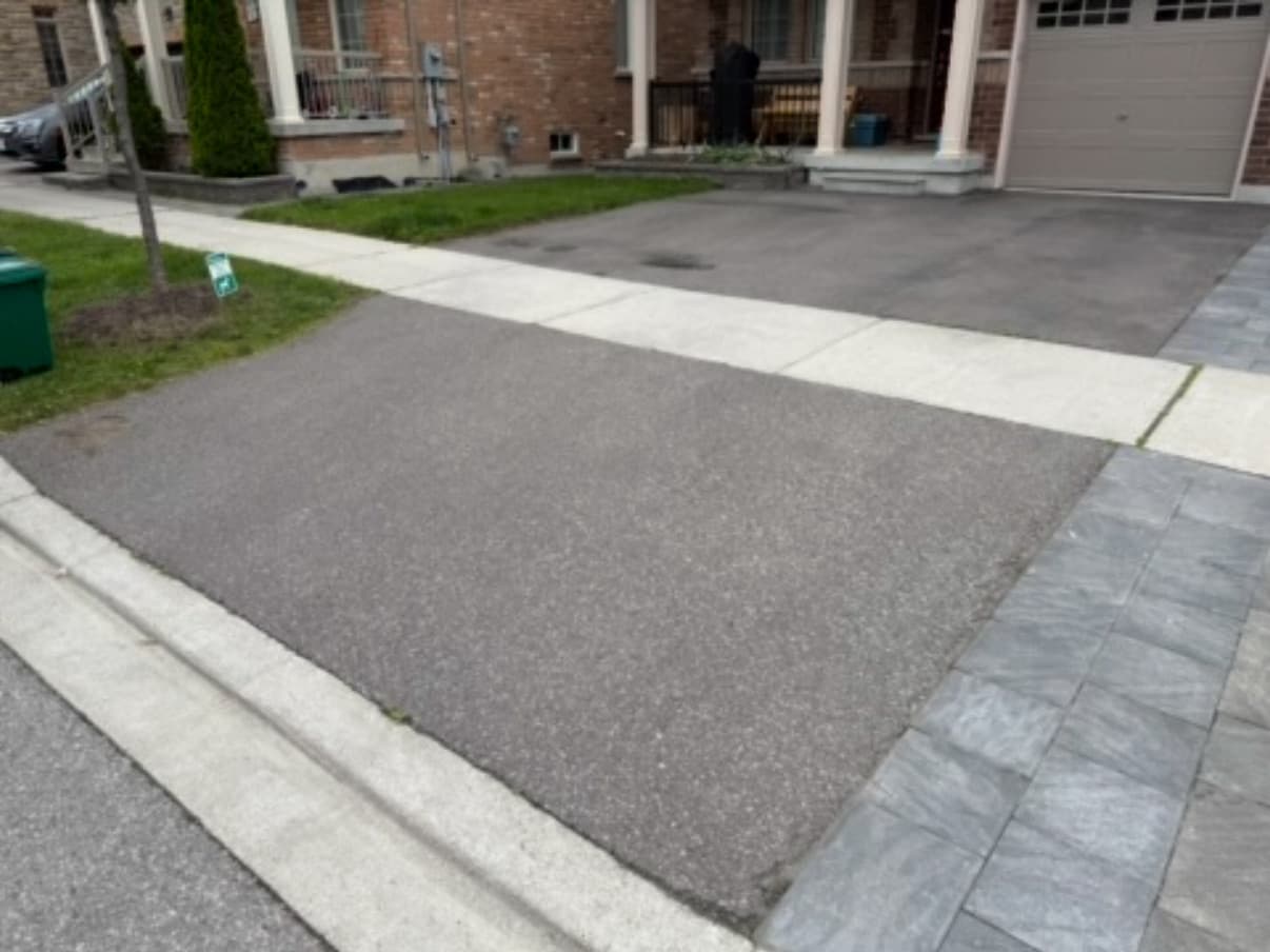 Before: Driveway resealed to a glossy, jet-black finish